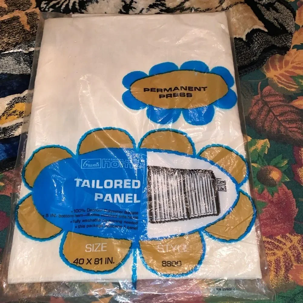 W. T. Grants Taylor ivory curtain panel 40 x 81“.